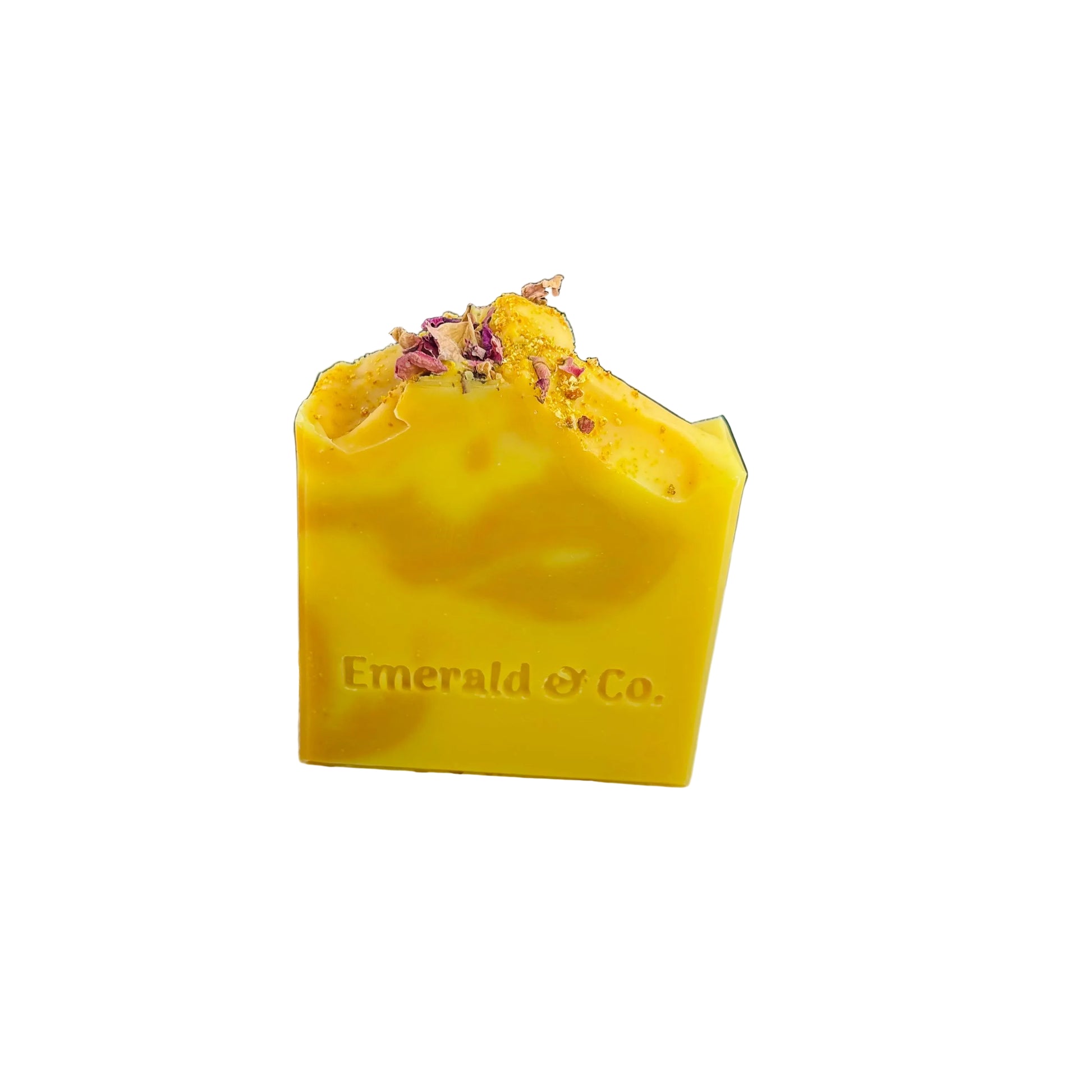 Yellow soap bar with 'Emerald & Co.' branding on a white surface.